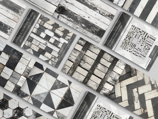Collage of print pads organised into neat rows opened on various pages to display the inside pages which contain white and black coloured wooden textures