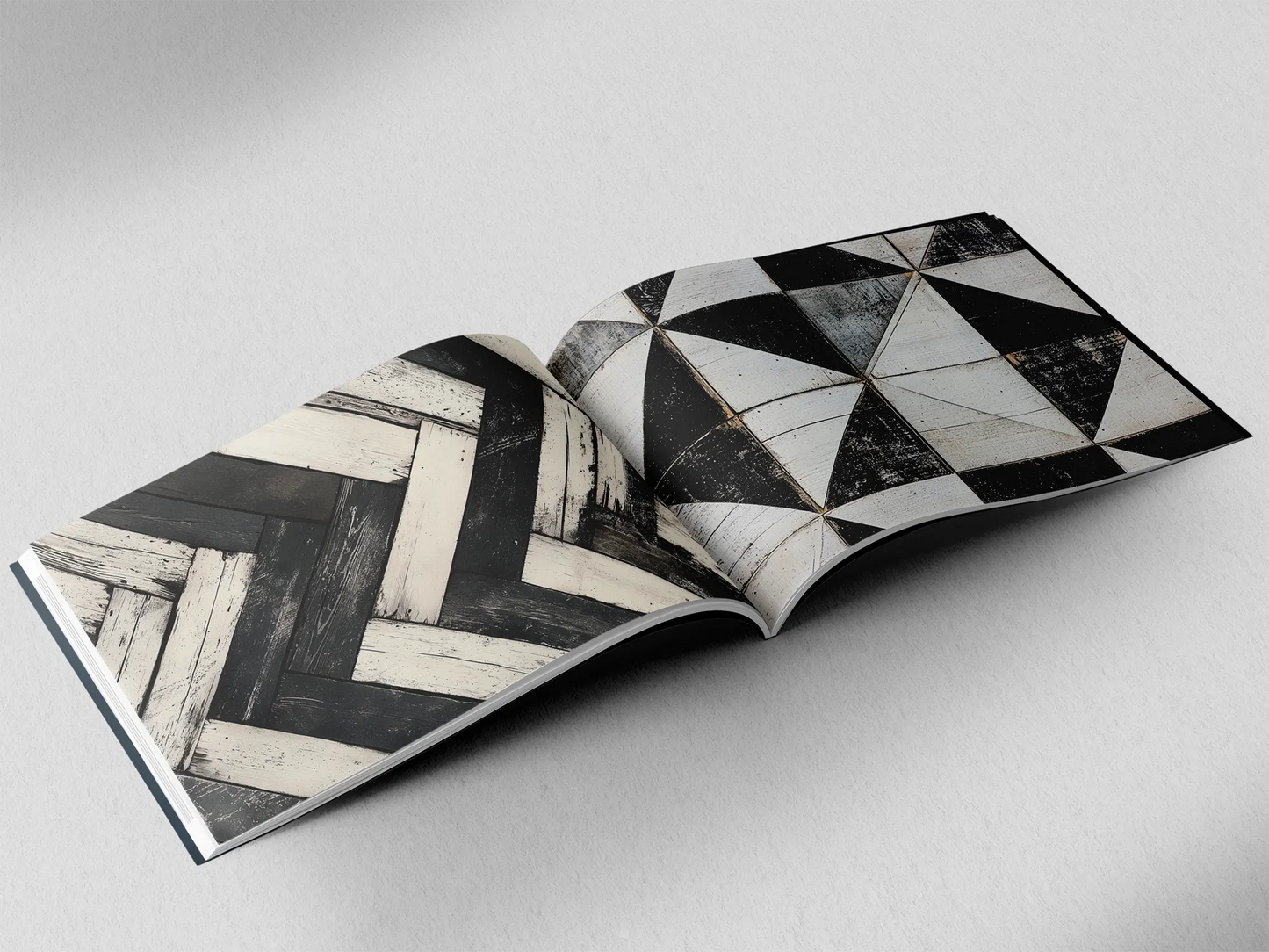 open book showing the inside pages of the decorative wooden textures prints pad. The picture inside the book is an black and white wooden boards texture