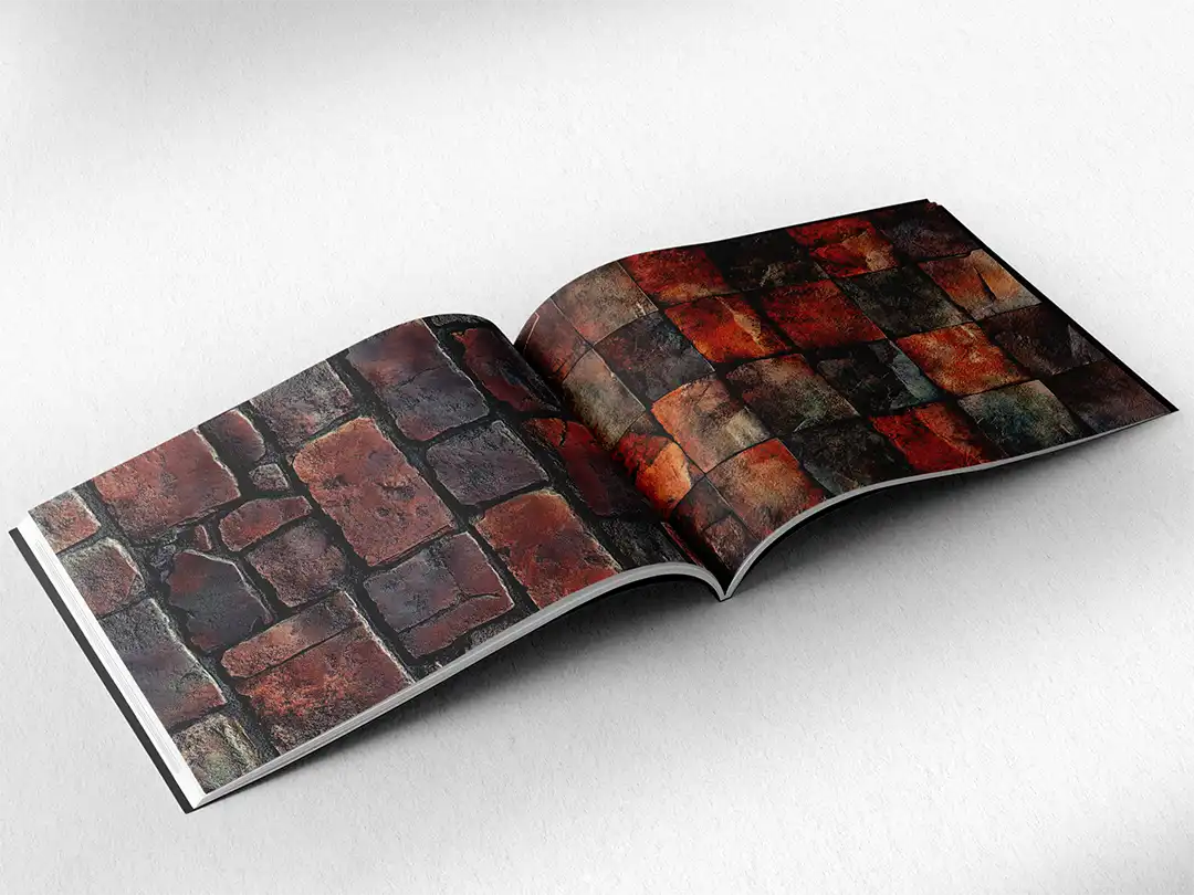 open book showing the inside pages of the decorative stone textures prints pad. The picture inside the book is a red stone texture