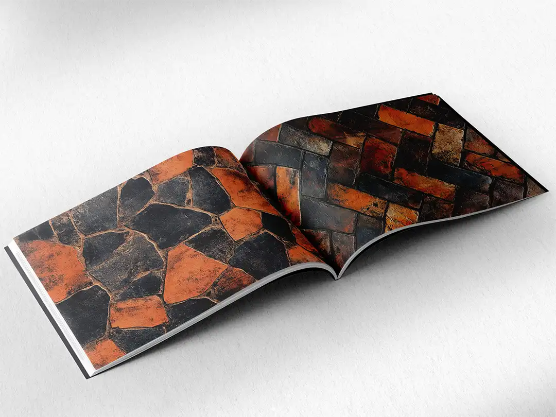 open book showing the inside pages of the decorative stone textures prints pad. The picture inside the book is a orange stone texture