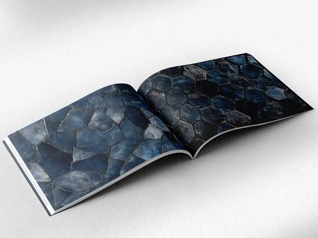 open book showing the inside pages of the decorative stone textures prints pad. The picture inside the book is a blue stone texture