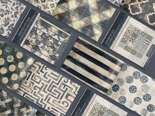 Collage of print pads organised into neat rows opened on various pages to display the inside pages which contain various dark blue coloured textures and patterns