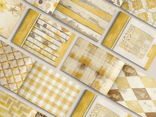 Collage of print pads organised into neat rows opened on various pages to display the inside pages which contain various yellow coloured textures and patterns