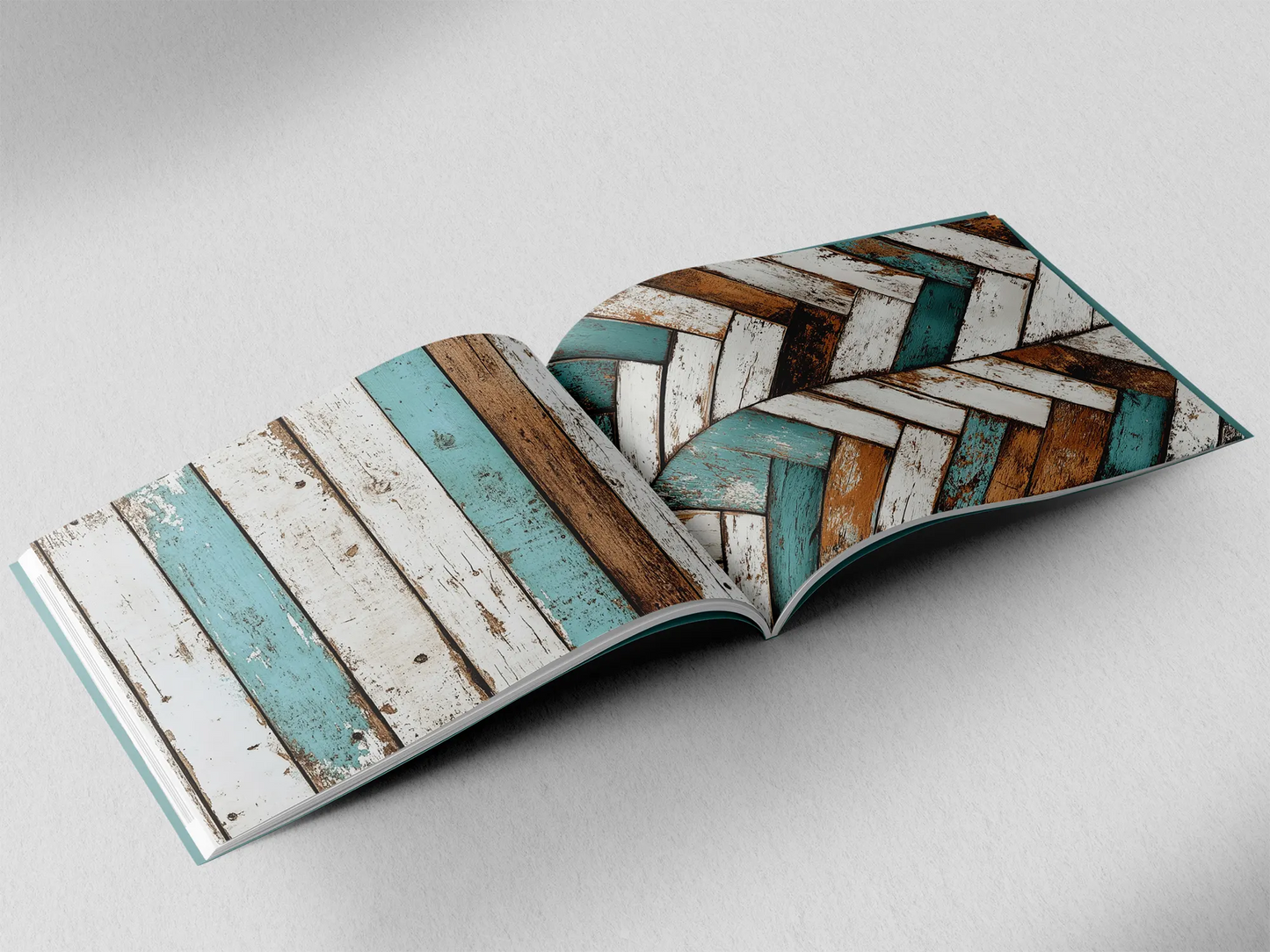 open book showing the inside pages of the decorative wooden textures prints pad. The picture inside the book is an turquoise and white wooden boards texture