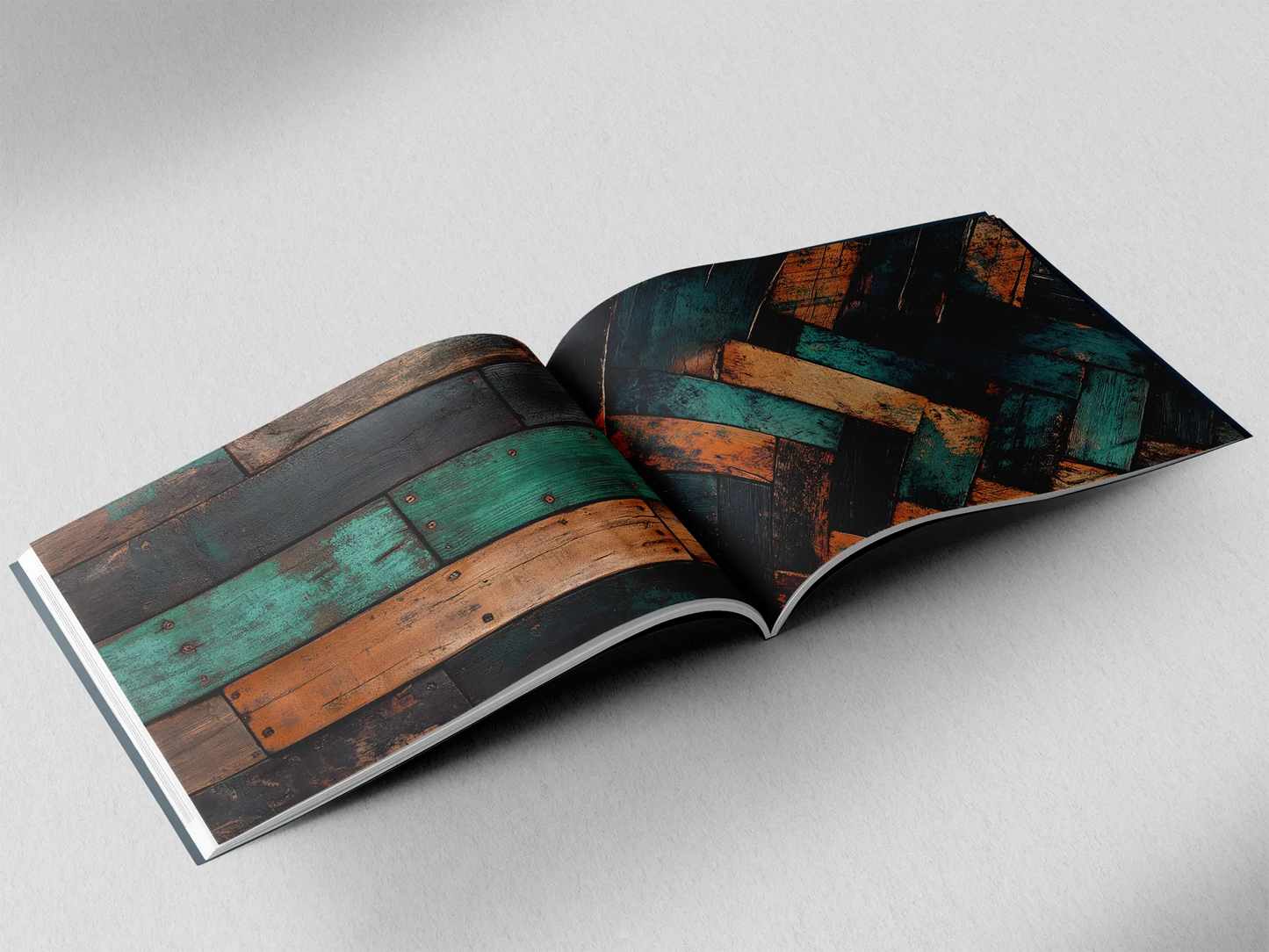 open book showing the inside pages of the decorative wooden textures prints pad. The picture inside the book is an orange and black and turquoise wooden boards texture