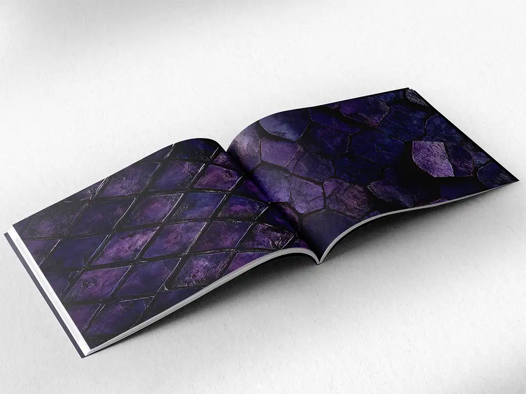 open book showing the inside pages of the decorative stone textures prints pad. The picture inside the book is a purple stone texture