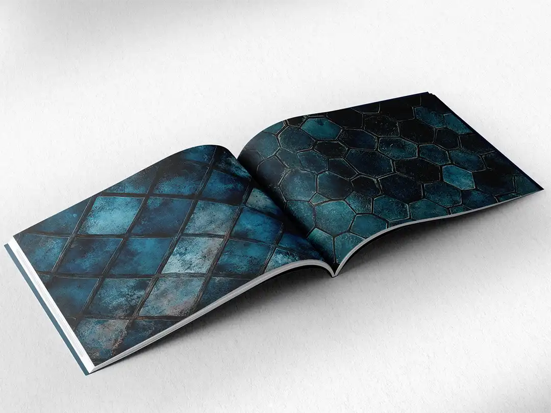 open book showing the inside pages of the decorative stone textures prints pad. The picture inside the book is a teal stone texture