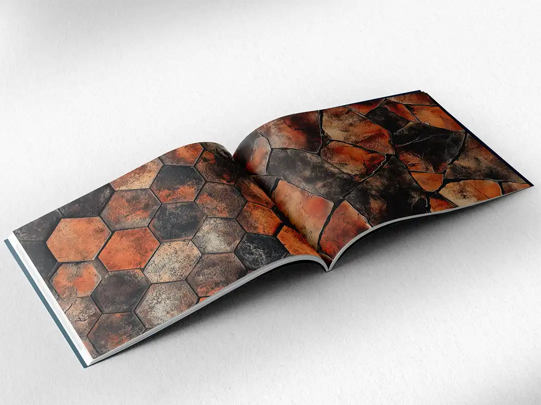 open book showing the inside pages of the decorative stone textures prints pad. The picture inside the book is a orange stone texture
