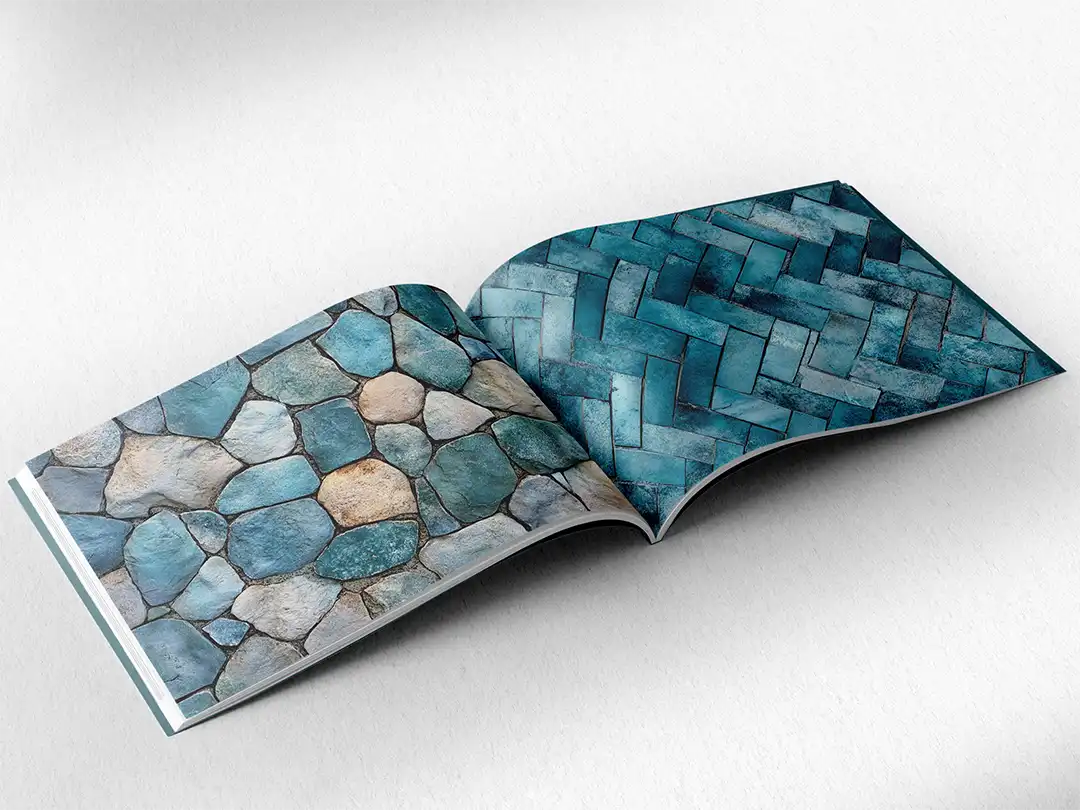 open book showing the inside pages of the decorative stone textures prints pad. The picture inside the book is a blue stone texture