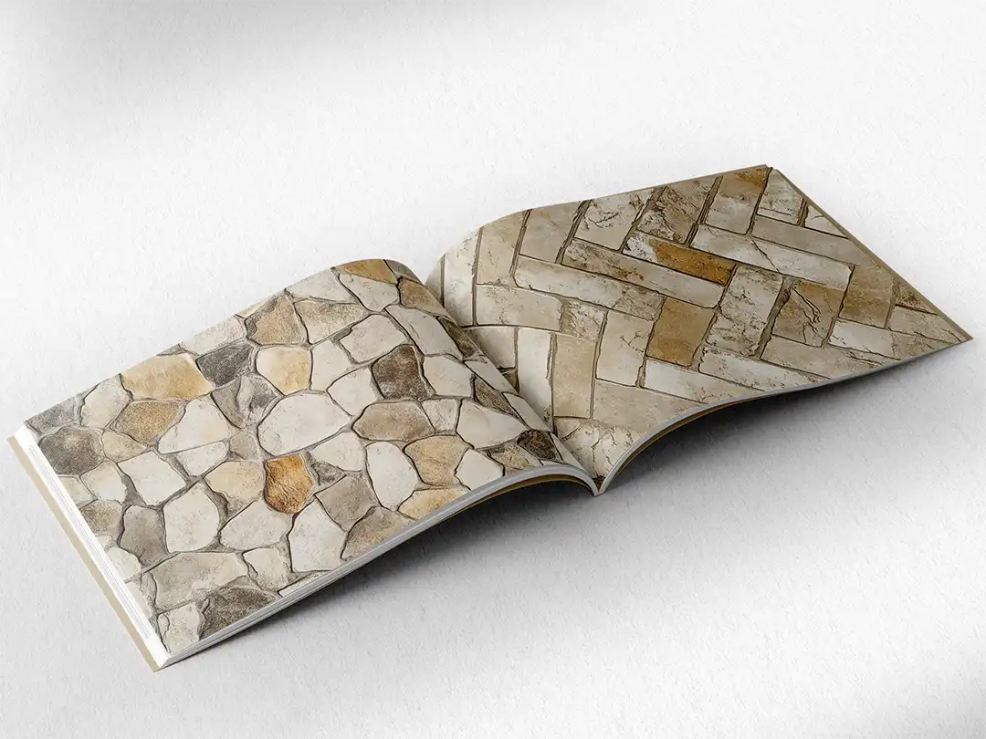 open book showing the inside pages of the decorative stone textures prints pad. The picture inside the book is a beige stone texture