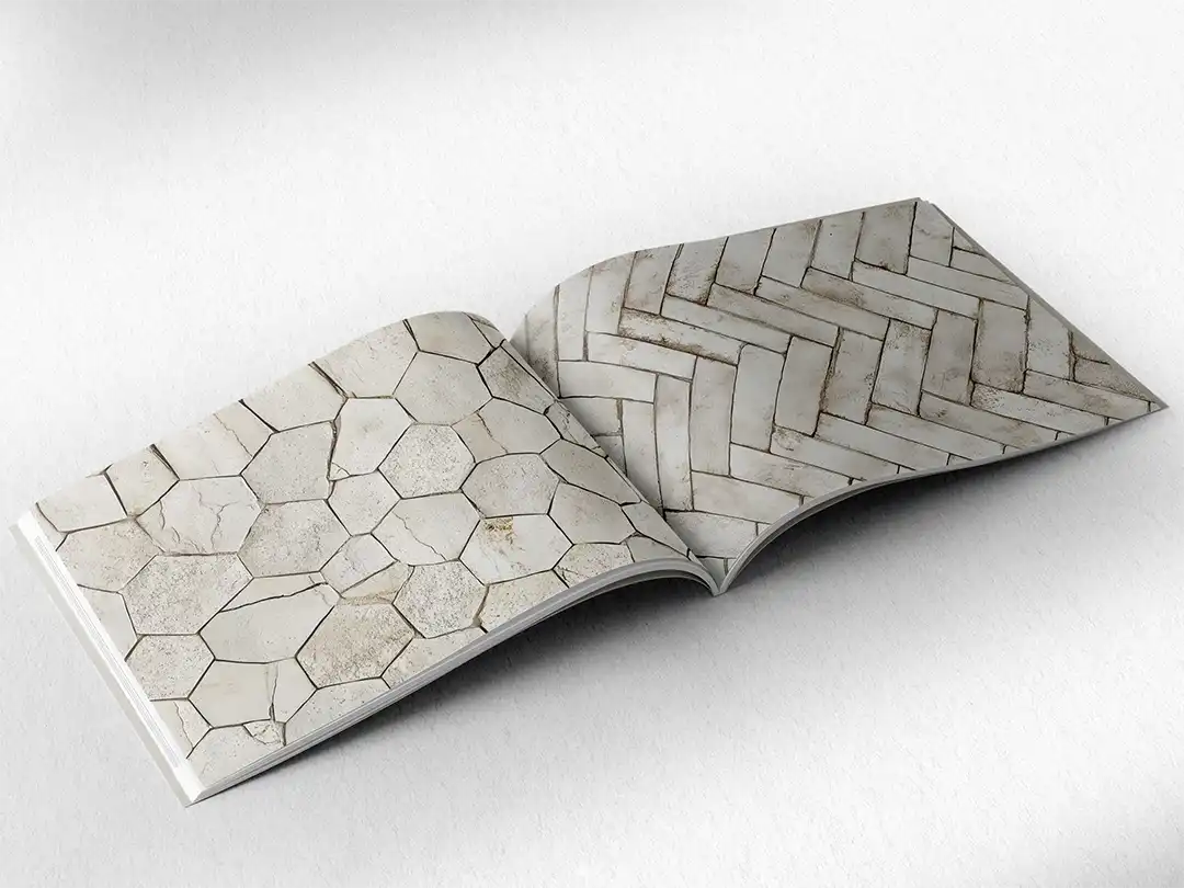 open book showing the inside pages of the decorative stone textures prints pad. The picture inside the book is a beige stone texture