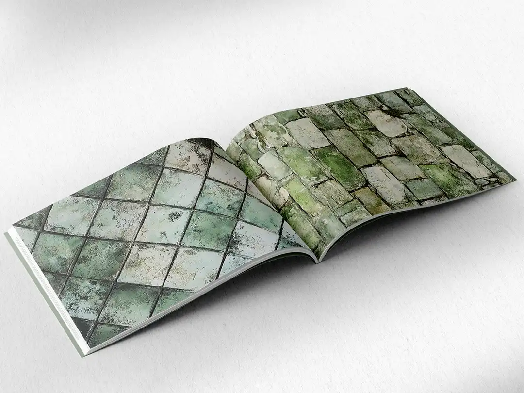 open book showing the inside pages of the decorative stone textures prints pad. The picture inside the book is a green stone texture