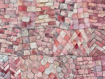 Collage of paper sheets showing the content of the stone textures prints pad. The images on the paper sheets are stone textures in pink colours