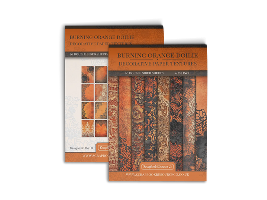 Front and Back cover of a decorative paper prints pad that contains orange vintage doilie patterns