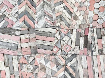 Collage of paper sheets showing the content of the wooden textures prints pad. The images on the paper sheets are wooden textures in pink and grey colours